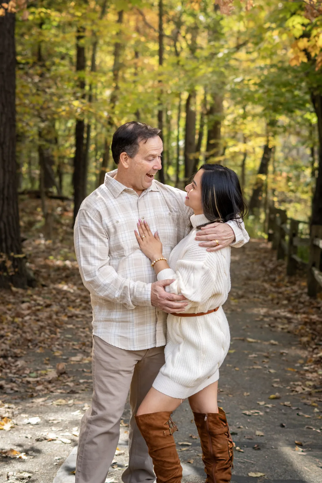 Belle Fall Pictorials candid couple laughing together in autumn woods