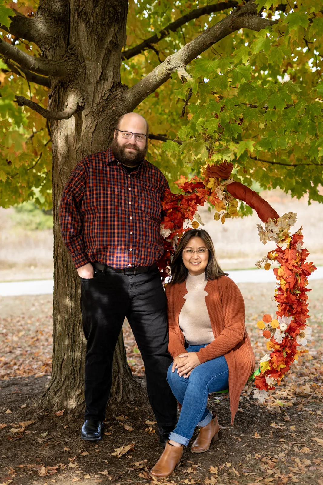 Grace Fall Pictorials couple portrait near fall tree swing