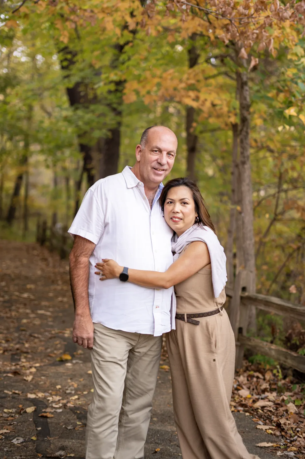 Nelia Fall Pictorials close couple portrait on a fall path